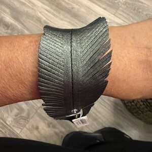 Elegant Feather Design Bracelet $25 each. Pick ur color. buy 1 get 1 free.
